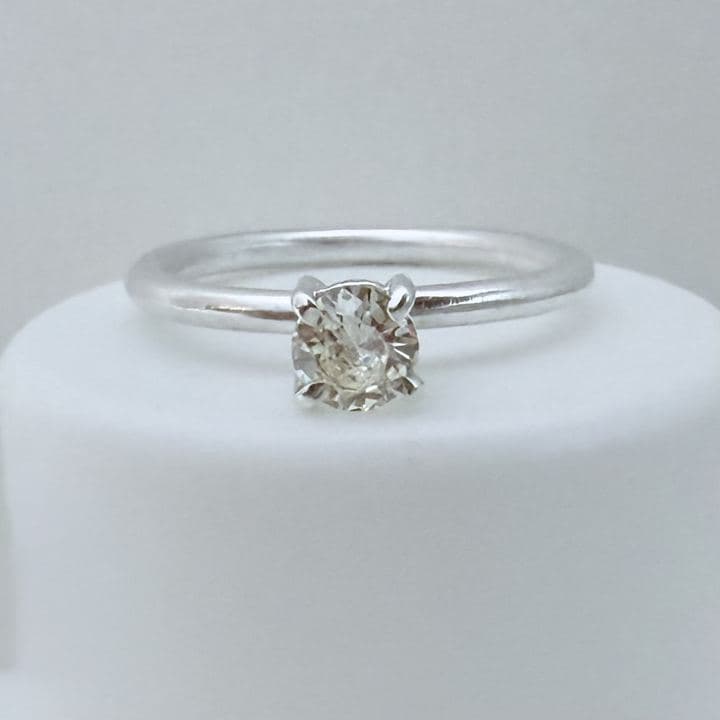 Champagne diamond solitaire, fine band