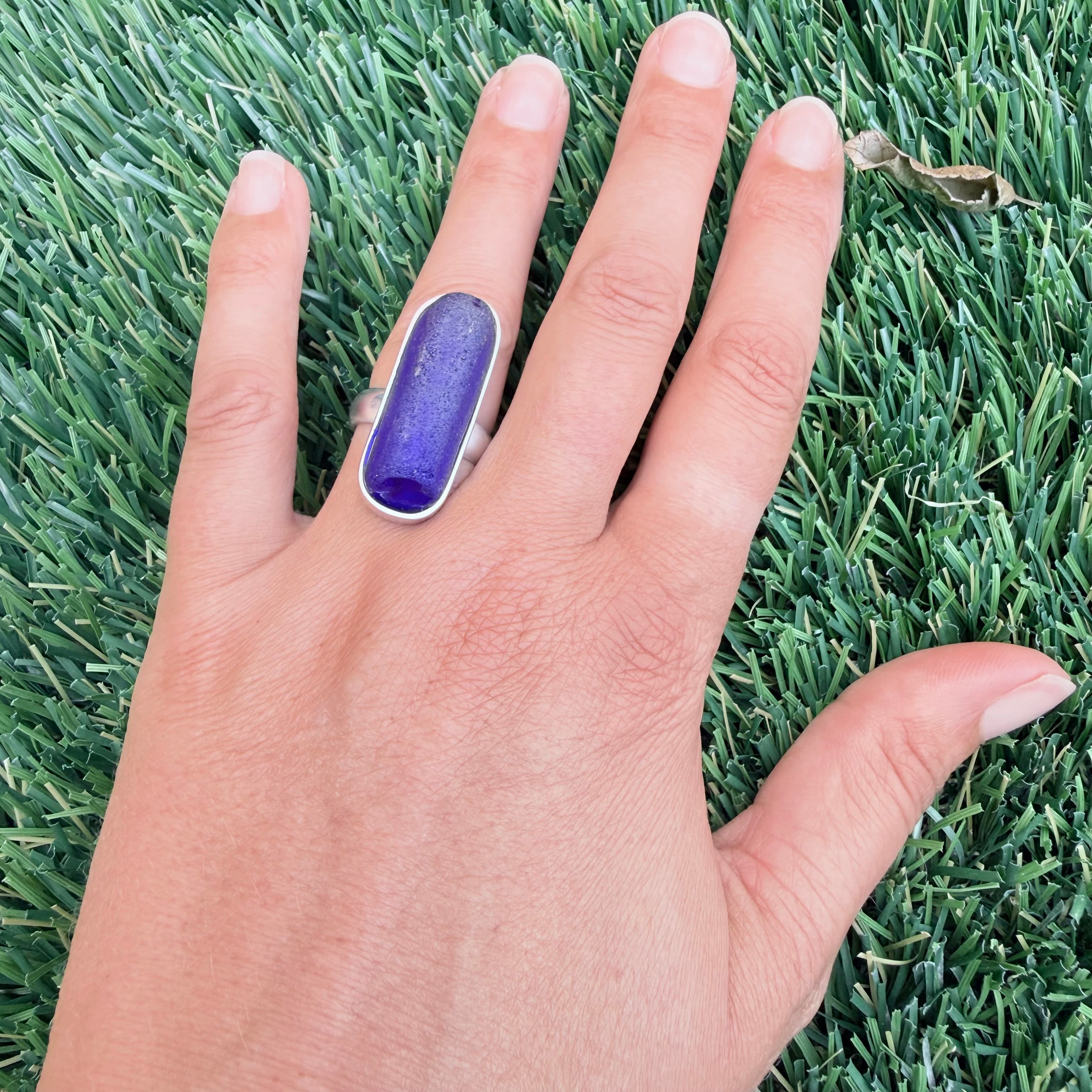 Dark blue sea glass cabochon ring