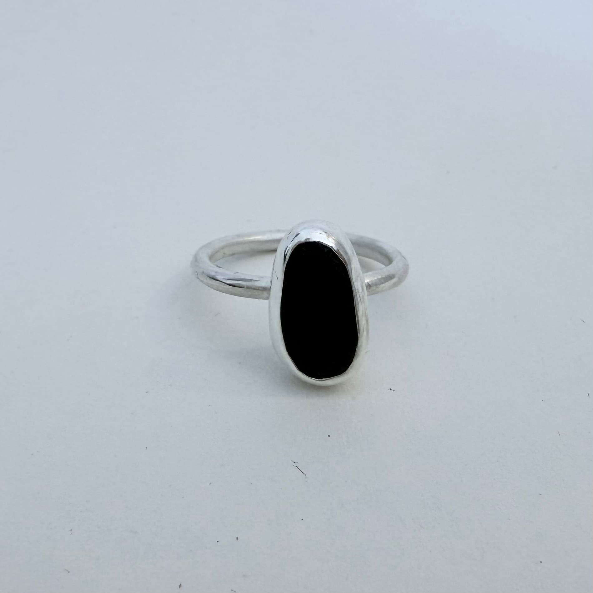 Ebony beach pebble cabochon ring